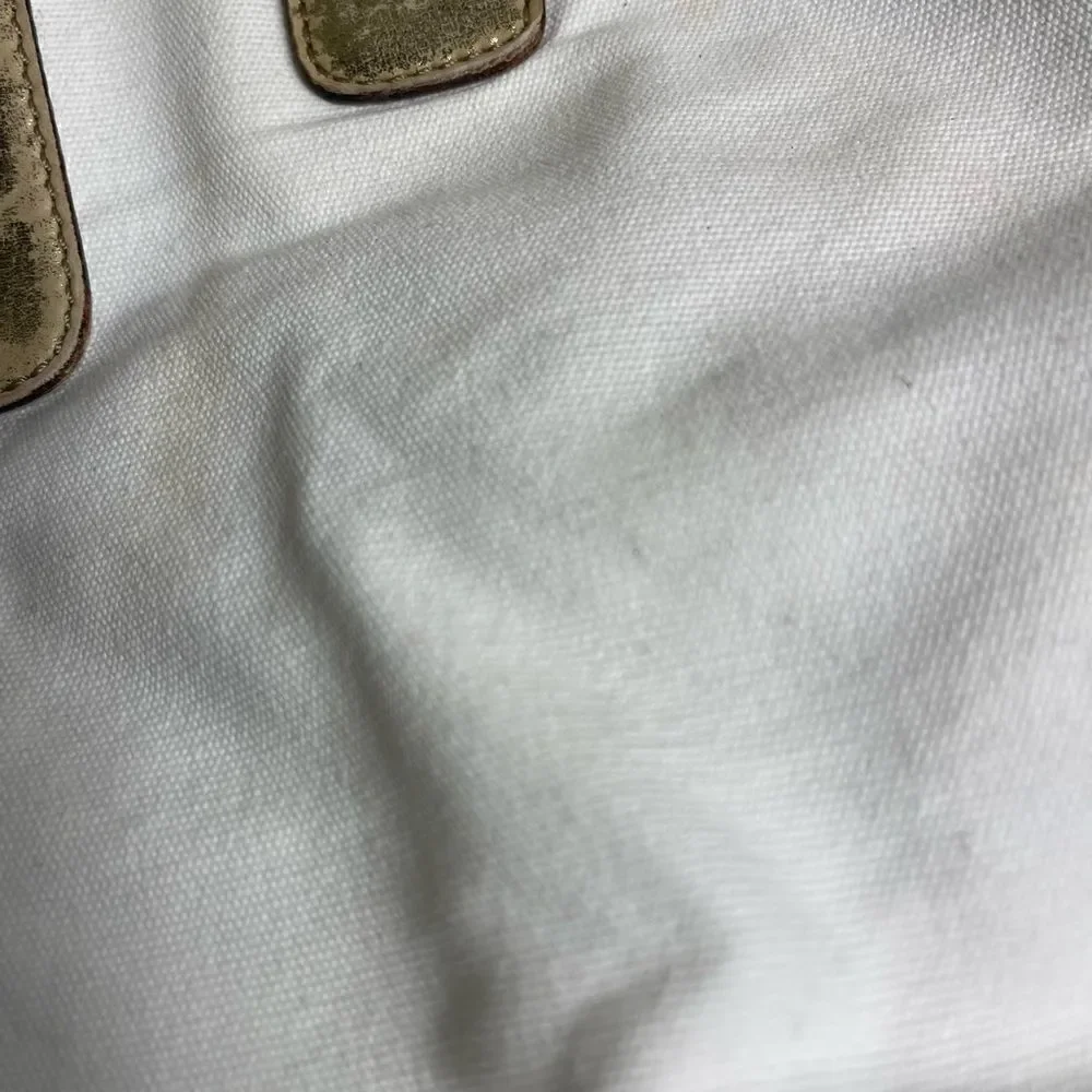 Vintage Kate spade beige canvas and faded gold trims shoulder bag.